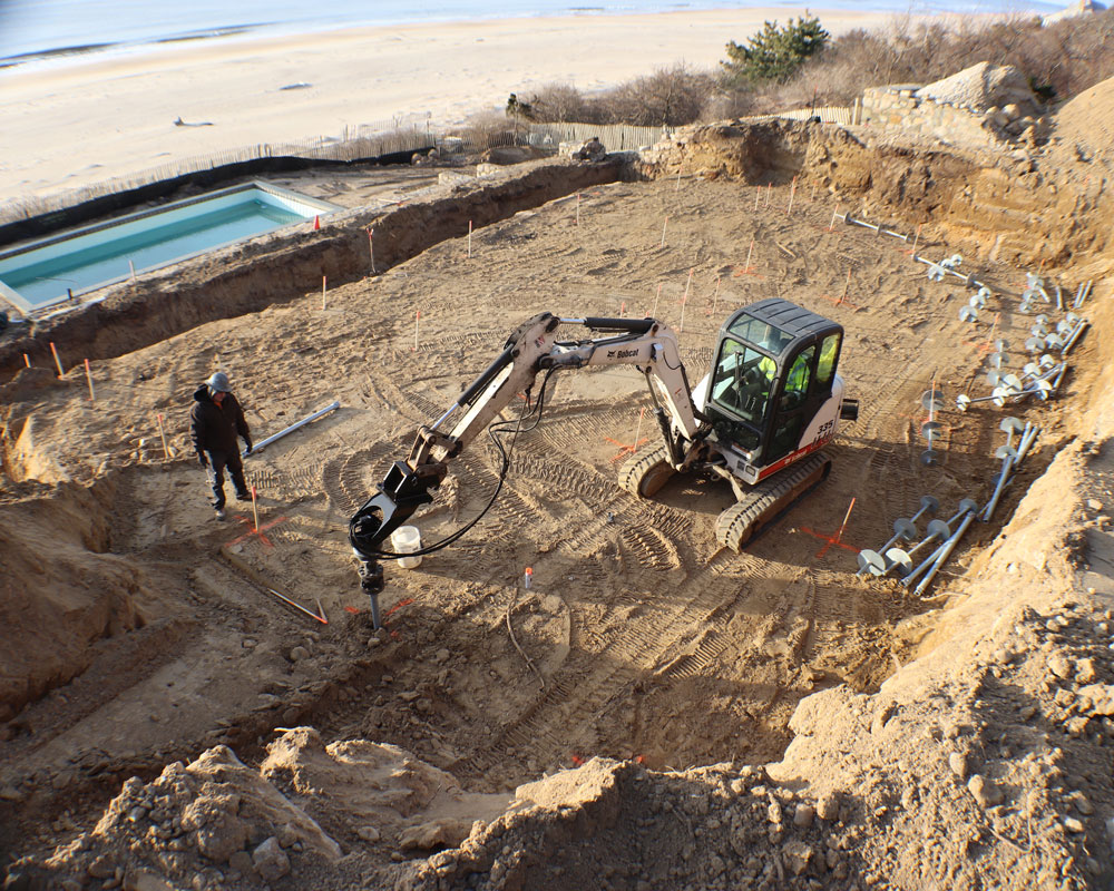overview of the work site while building retaining wall in FEMA designated flood zone